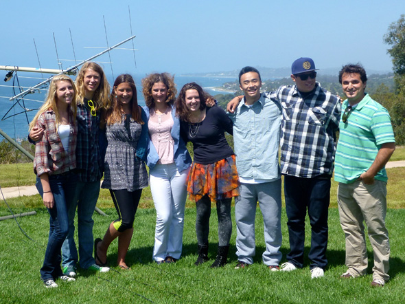 ANSEC Team members pose next to the satellite antenna array after the contact with Astronaut Chris Cassidy.